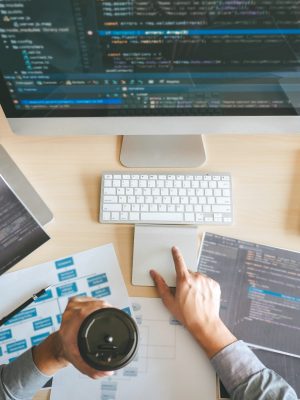 Professional Developer programmer working a software website design and coding technology, writing codes and database in company office, Global cyber connection technology.